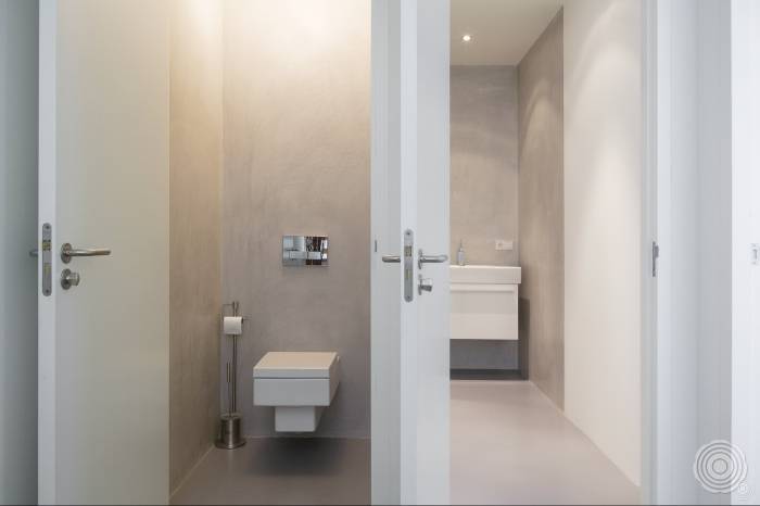 a relaxed shower room showering on a clean floor excess wate